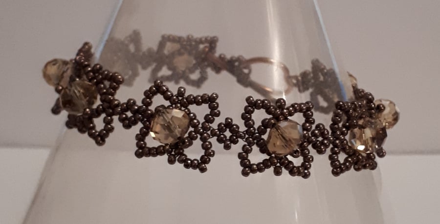 Chocolate brown seed bead and pale gold crystal bracelet