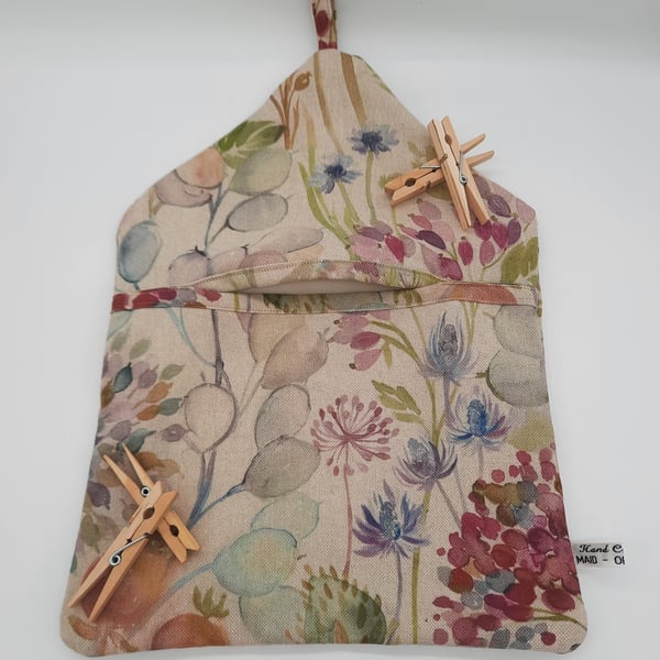 Clip on peg bag in beige floral print 