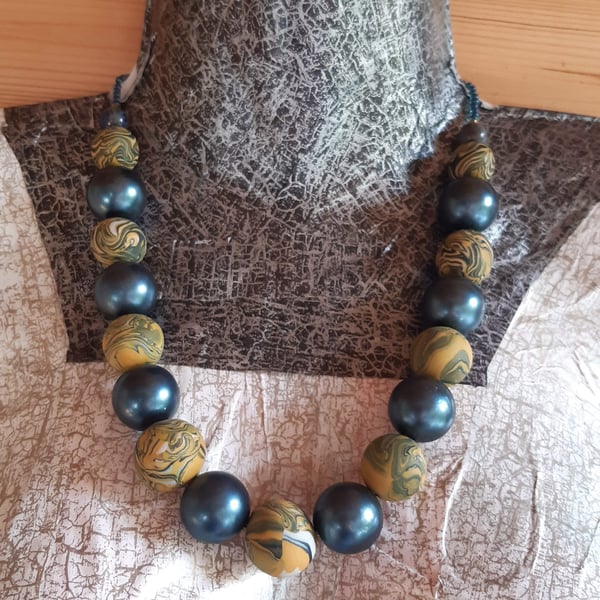 Chunky polymer clay necklace in navy and mustard