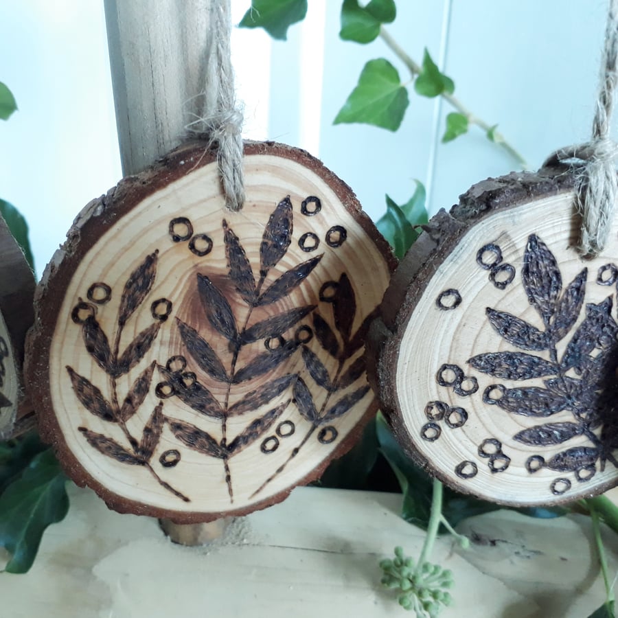 Five pyrography rowan wood slice hanging decorations