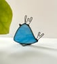 Streaky blue stained glass bird ornament with funky hair, Bird with Attitude