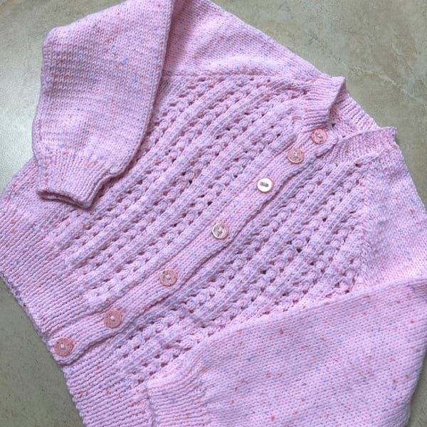 Girl's hand knitted lacy cardigan in pink to fit age 4 - 5 years