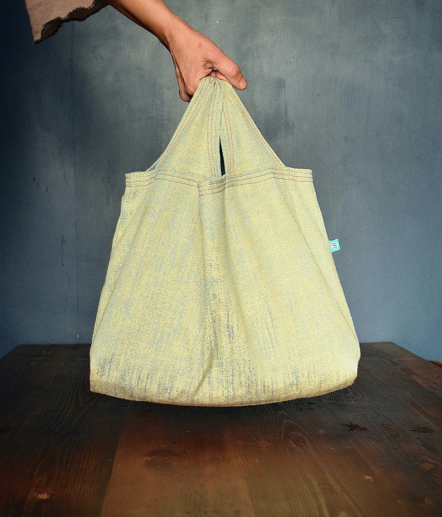 shopping bag – textured pale blue shot with buttermilk, with pale blue interior