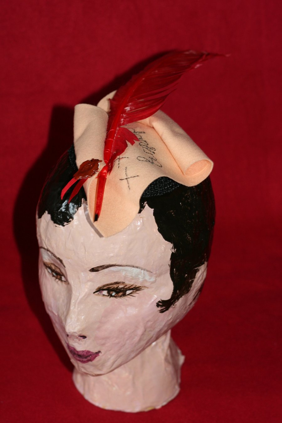 Felt and feather love letter fascinator
