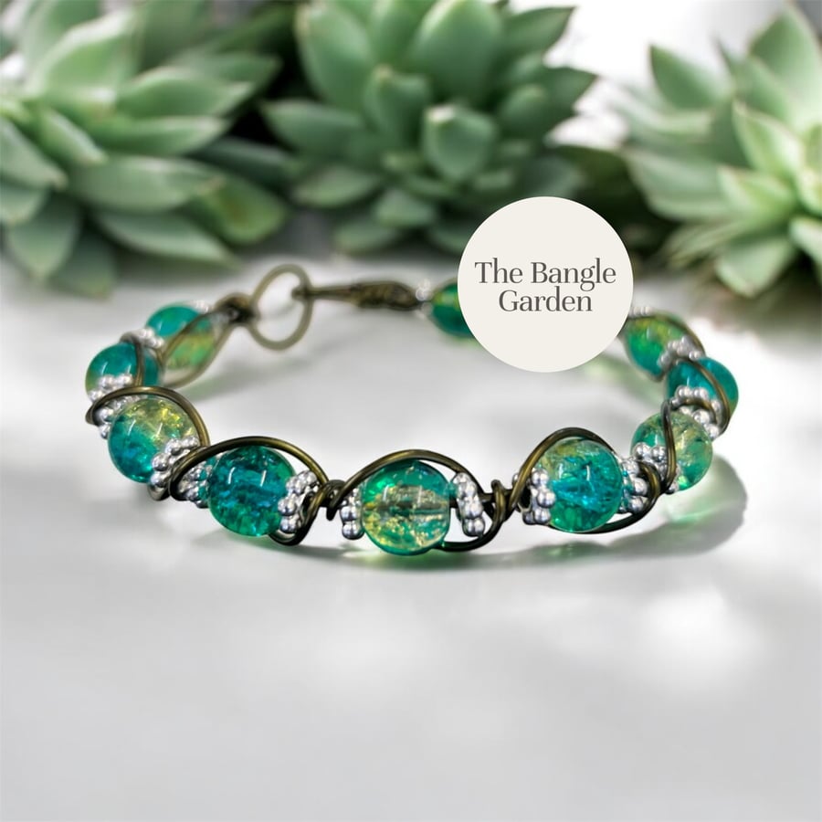 Handmade wire wrapped bangle with vibrant green variegated beads 