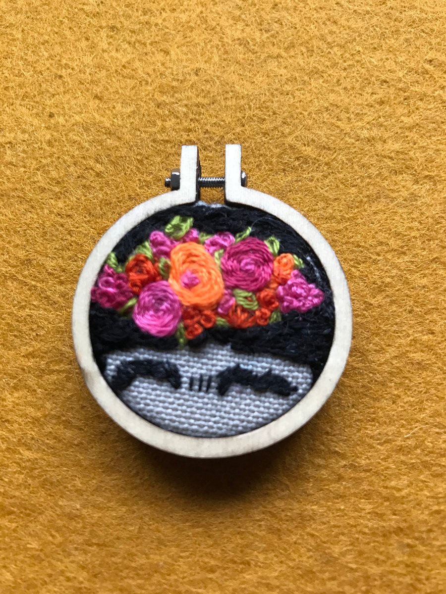 Frida Kahlo inspired embroidered pendant.