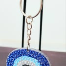 Protective eye keyring 