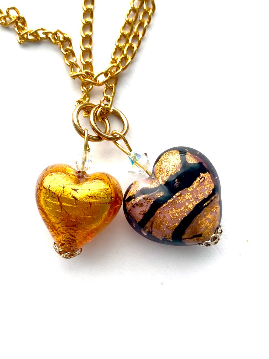 Murano glass gold double heart pendant with Swarovski crystal.