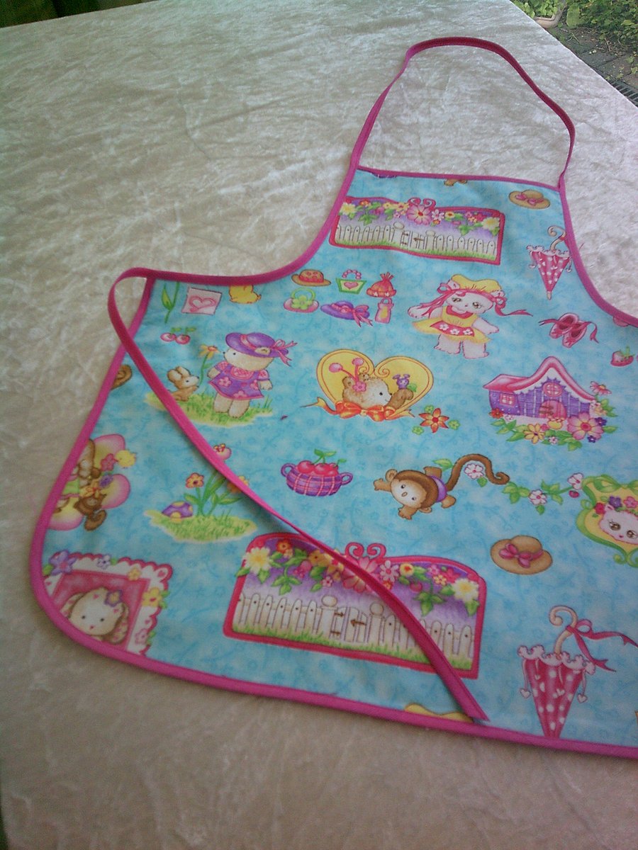 Turquoise Baby Apron with Pretty Cats, Dogs and Teddy Bears