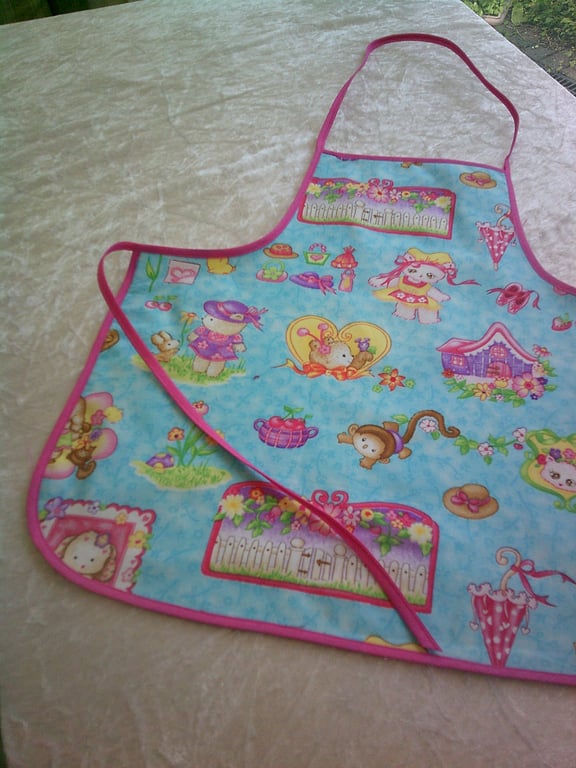 Turquoise Baby Apron with Pretty Cats, Dogs and Teddy Bears