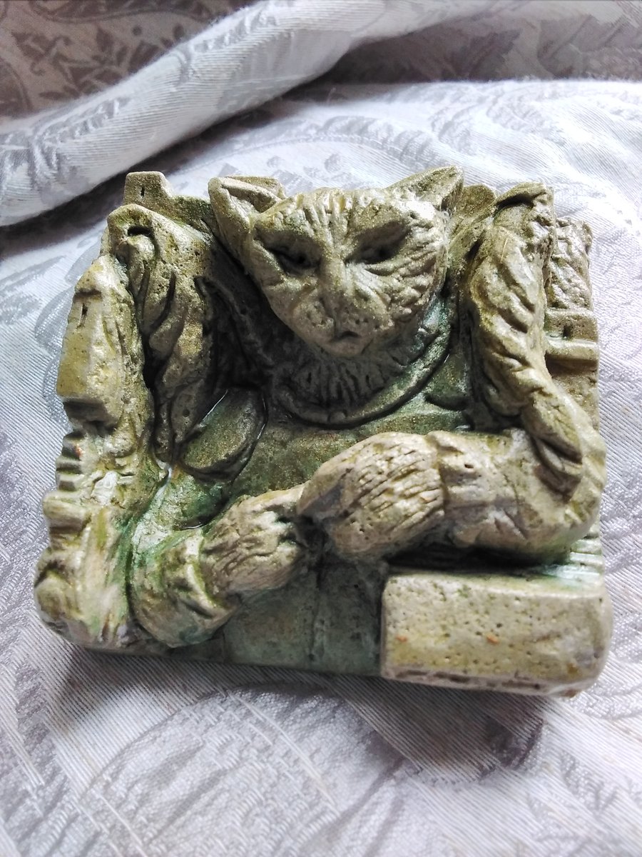 Winged Cat in Armour carving 