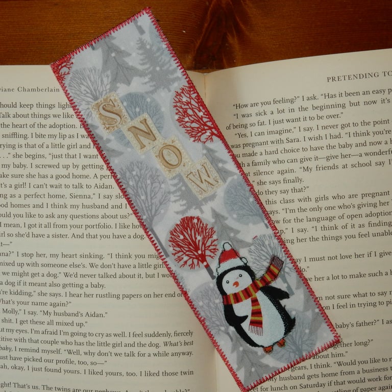 Bookmark penguin in the snow