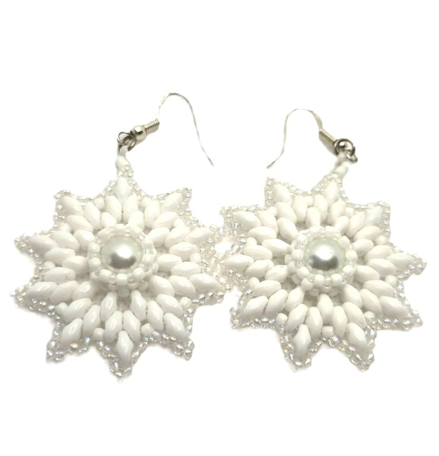 White beaded snowflake drop earrings with faux pearl centres
