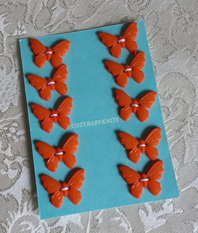 ORANGE BUTTERFLY BUTTONS WITH TWO HOLES FOR ATTACHING 