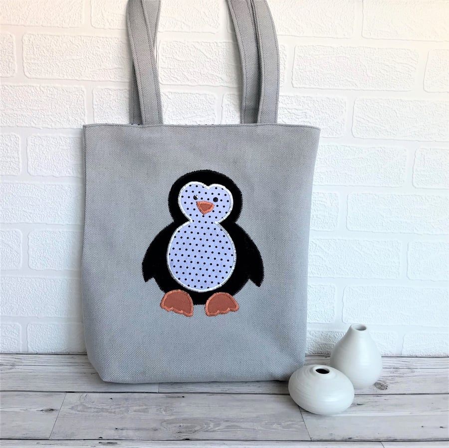 Penguin tote bag in pale grey with black and white polka dot penguin