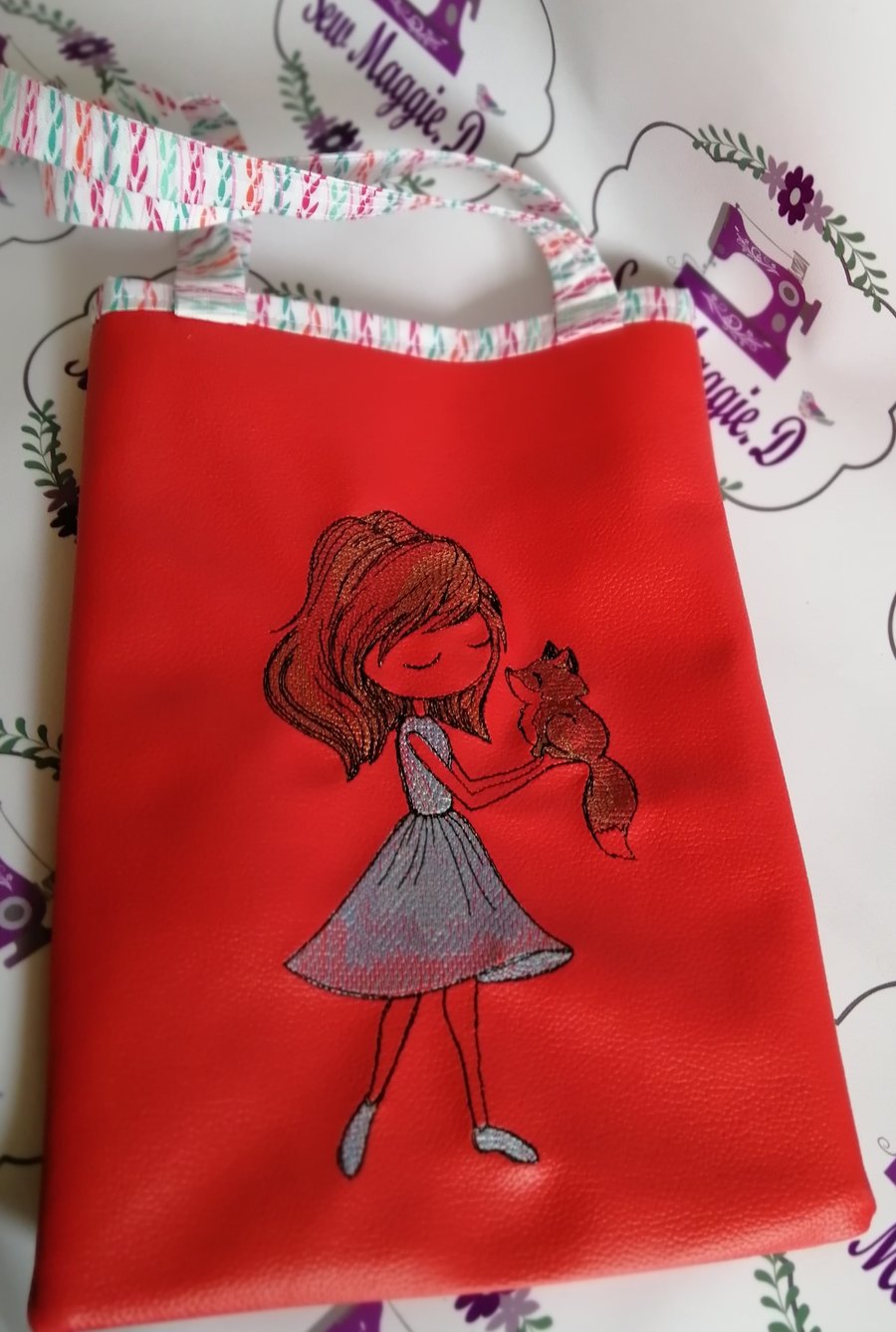 CHILD'S RED FAUX LEATHER BAG
