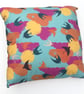 Fly free cushion with colourful bird print 