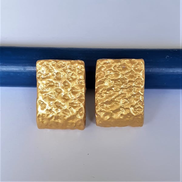 Gold coloured contemporary stud earrings