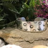 Hand Stamped Wide Cuff Bangle with Heart Burst design