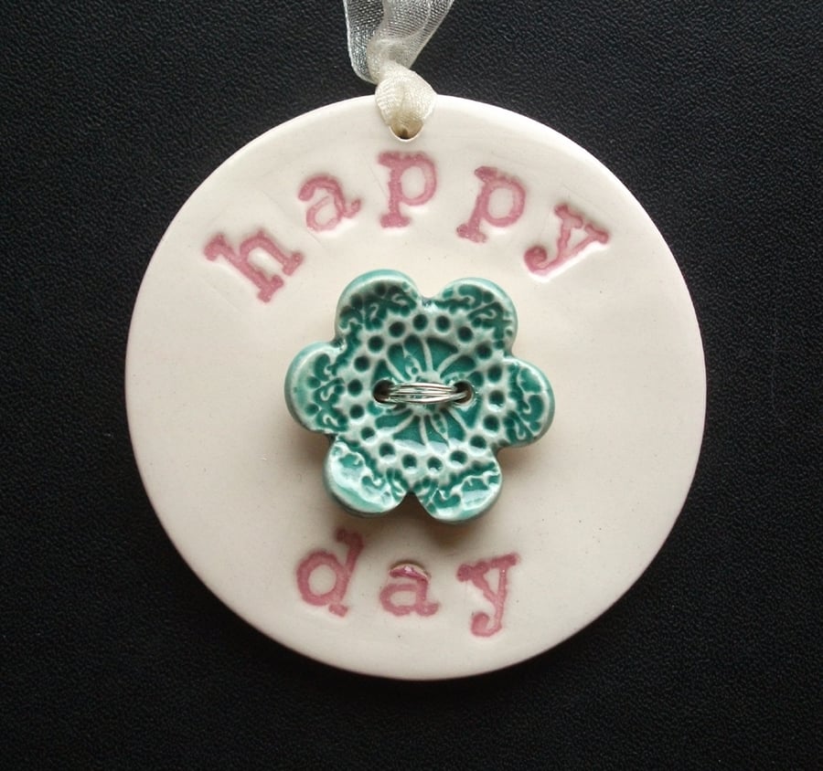 Ceramic decoration Happy Day with flower button