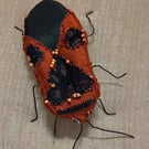 Cinnamon bug sculpture 