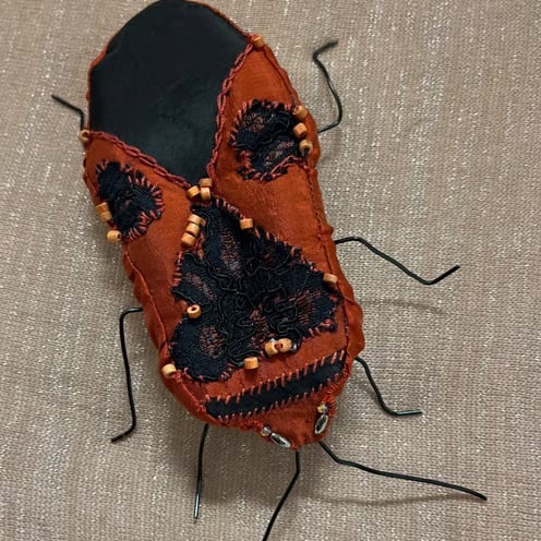 Cinnamon bug sculpture 