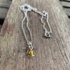 Tiny sterling silver star pendant with citrine crystal bead