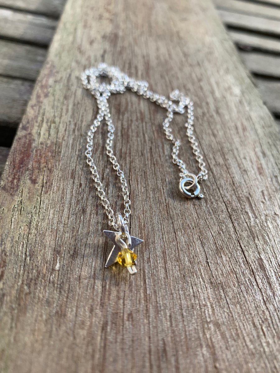 Tiny sterling silver star pendant with citrine crystal bead