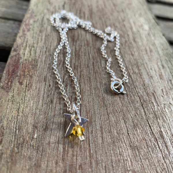 Tiny sterling silver star pendant with citrine crystal bead