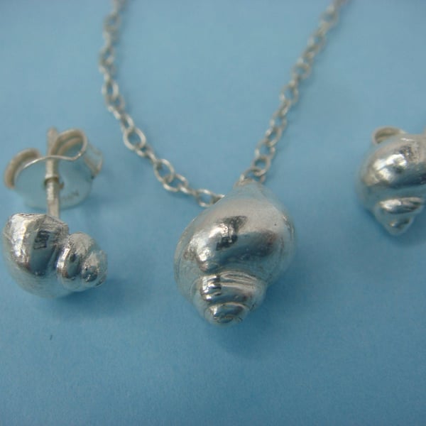 Tiny seashell stud earrings and pendant made from fine silver with a silver trac