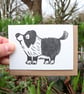 Hand printed linocut card featuring a border collie dog - small card