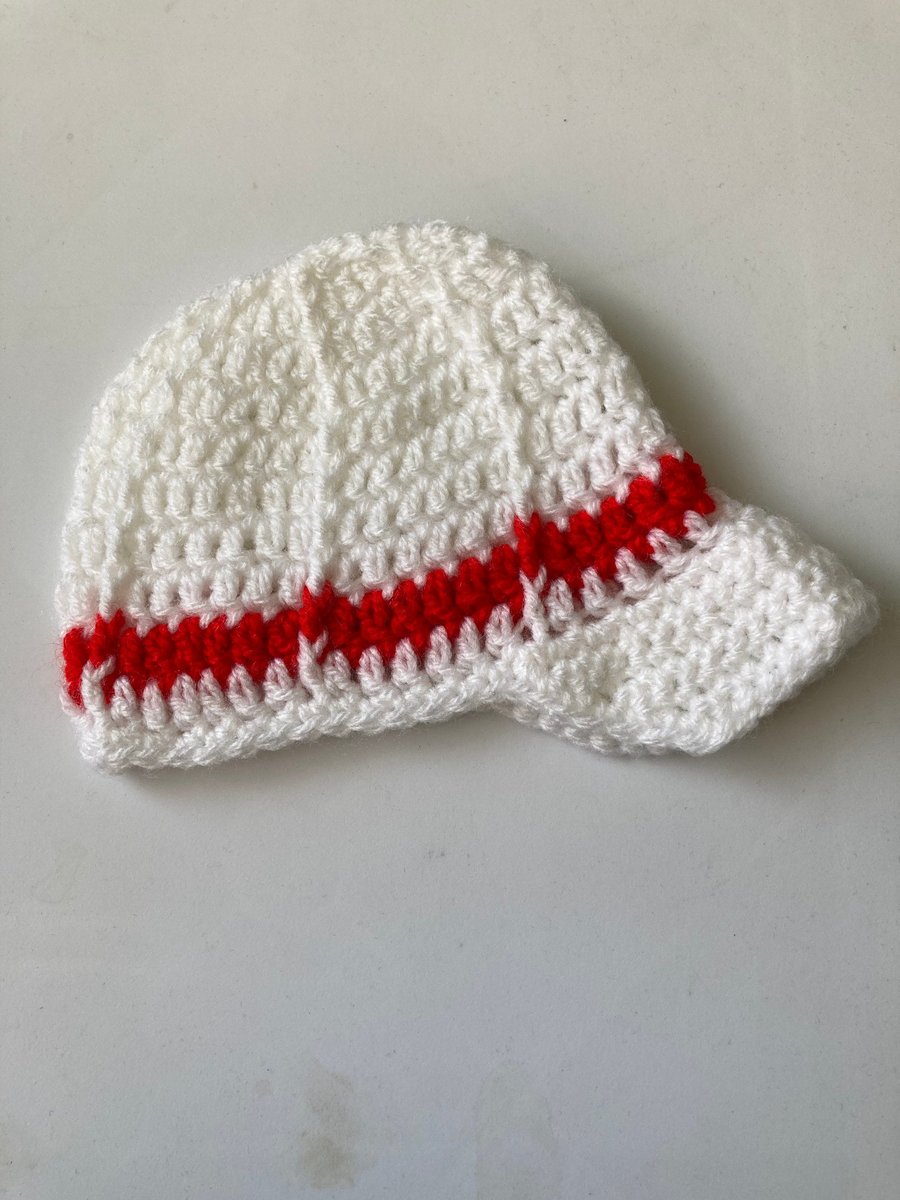 42-77. Crochet baseball cap.