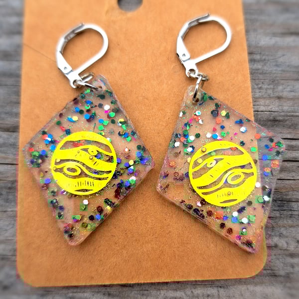 Diamond shape resin dangle earrings with a selection of glitter and moon