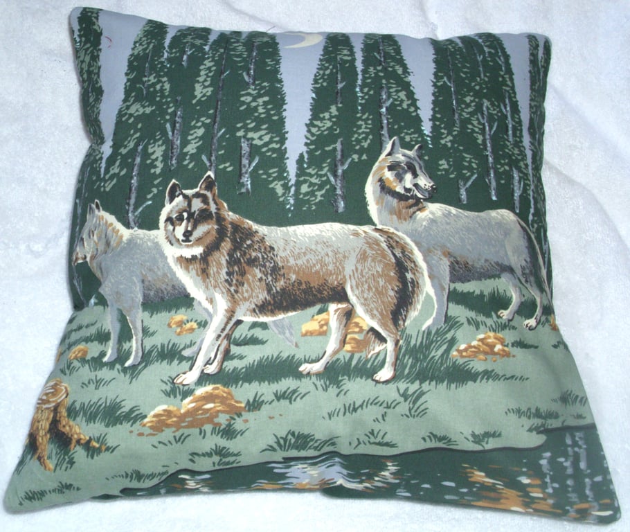 Wolf pack by a river in the moonlight cushion