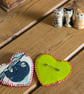 Sloth brooch - heart shaped hand stitched fabric brooch featuring a sloth - Image 4