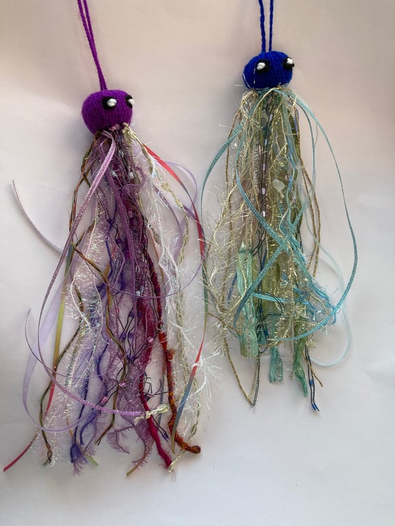 2 hand knitted sparkly jellyfish