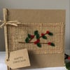 Festive branch with red berries. Felt, handmade Christmas card.