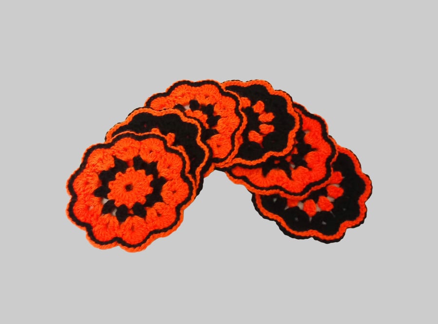 Coasters for Halloween in orange and black, set of six, crochet table mats