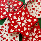 Scandi-style red and white star shaped Christmas decorations
