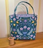 Fabric gift bag: floral display on teal