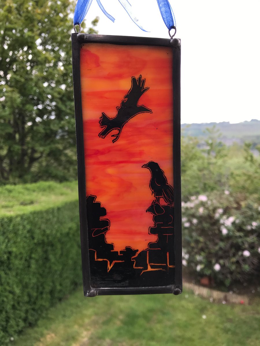 Crow stained glass panel