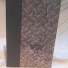 A5 notebook handbound in metal-look paper
