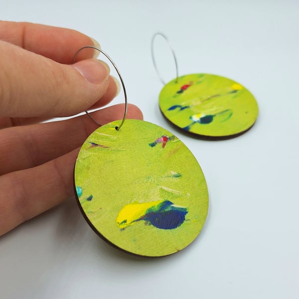 Lime green wooden disc earrings with hot pink, navy blue, white and yellow