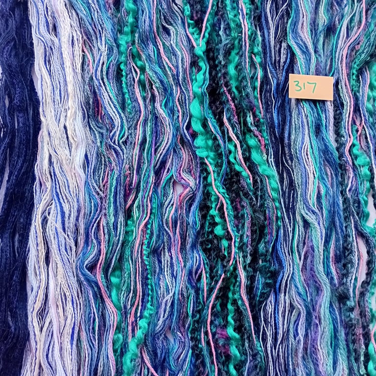 Tapestry, embroidery, weaving, tassel making threads, yarns and fibres. 