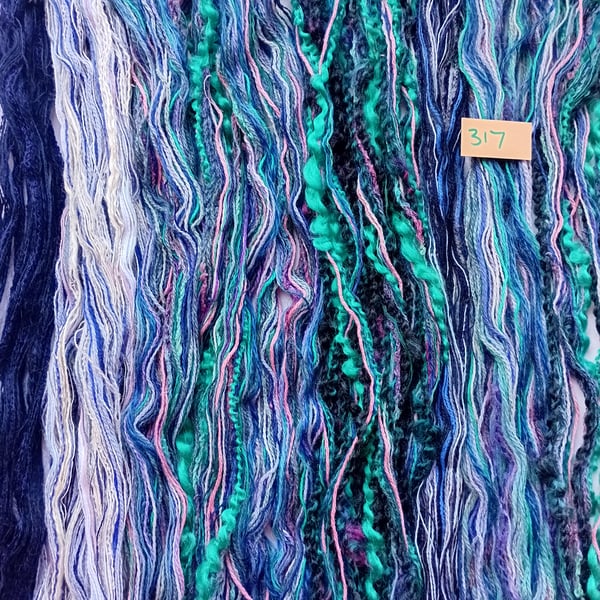 Tapestry, embroidery, weaving, tassel making threads, yarns and fibres. 