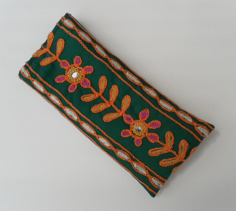 Sunglasses, glasses case, green embroidered fabric