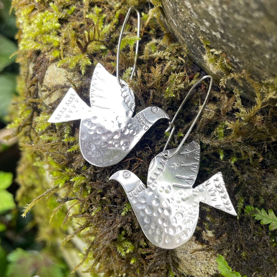 Big silver scandi style dove earrings