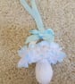 Lace pram charm hand knitted baby dummy shape - Image 1