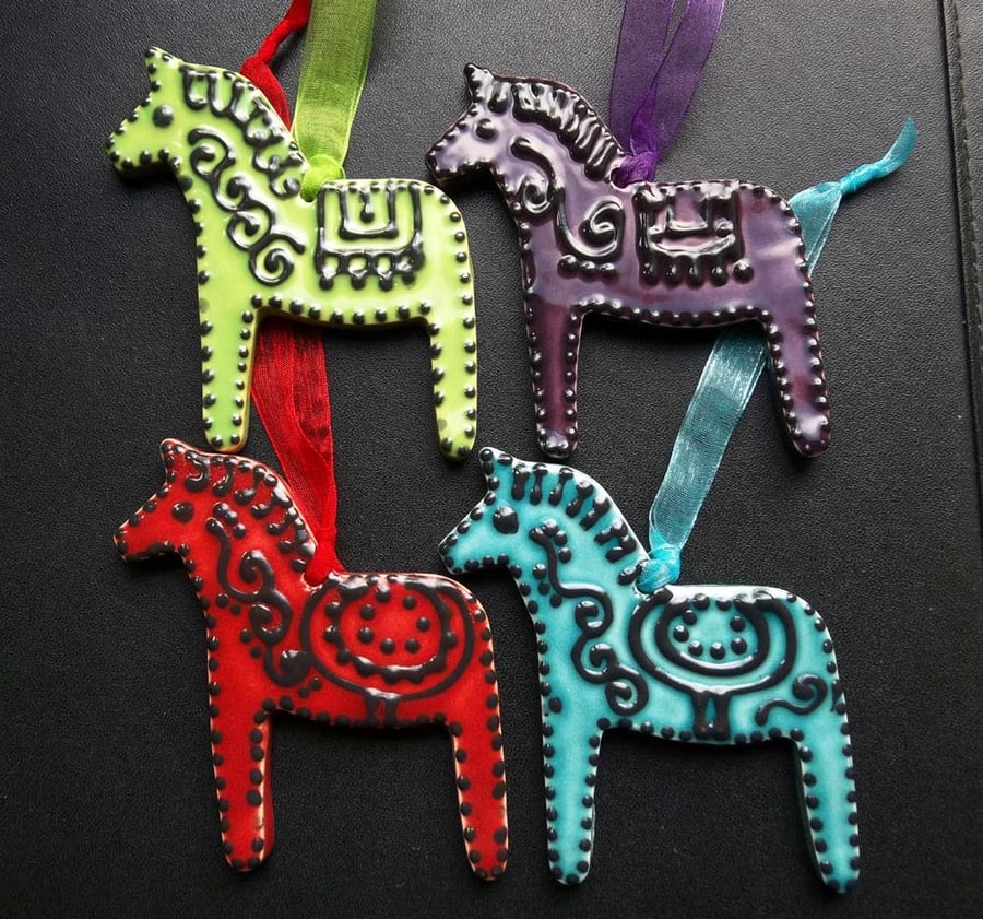Set of four ceramic folk art horses hanging decorations