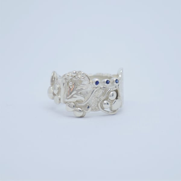 Solid silver ring set with three Ceylon sapphires